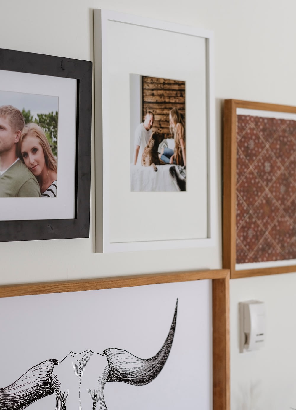 a gallery wall with printables, and pictures