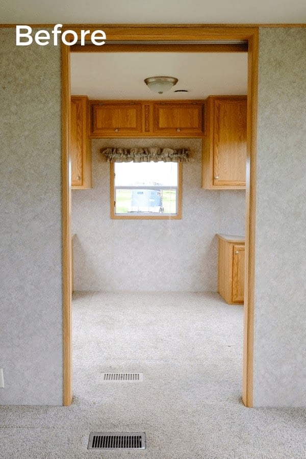 a RV window with valance and blinds 