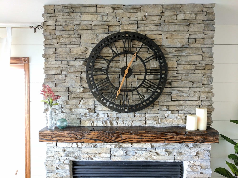 Stone veneer fireplace after picture