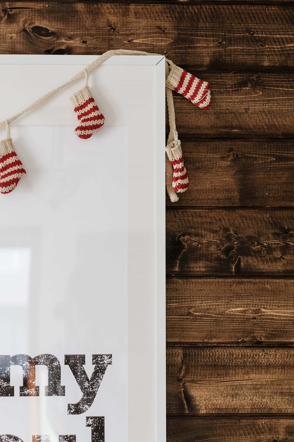 walnut shiplap accent wall with christmas stockings