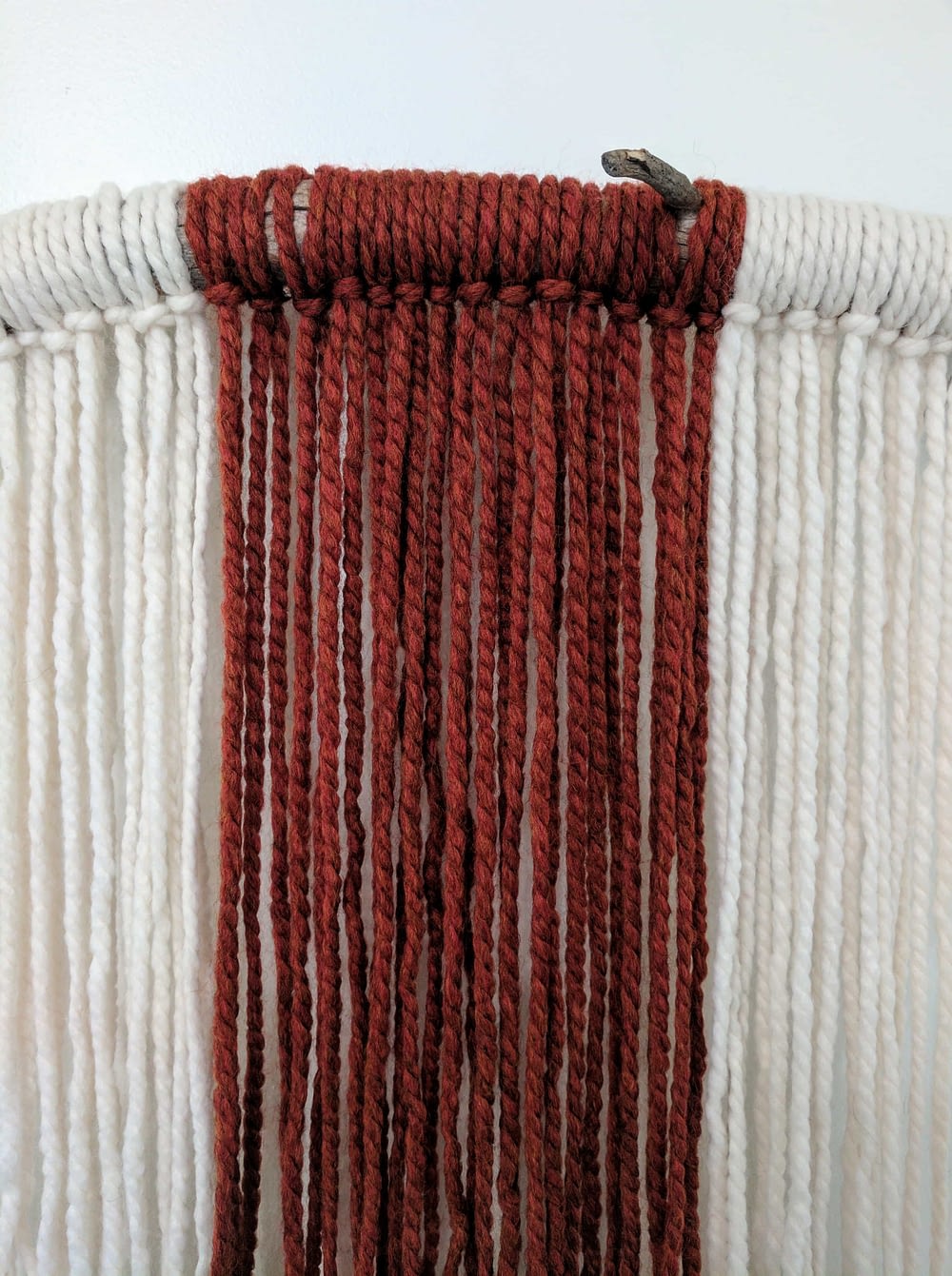 close-up of the DIY wall hanging yarn