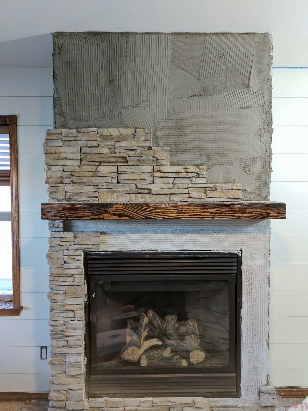 Stacked Stone Fireplace Remodel, How To Install Stone Around Gas Fireplace