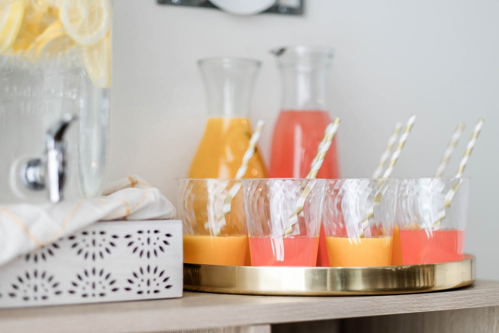 Chinet® Cut Crystal® Beverage Station with orange juice and grapefruit juice