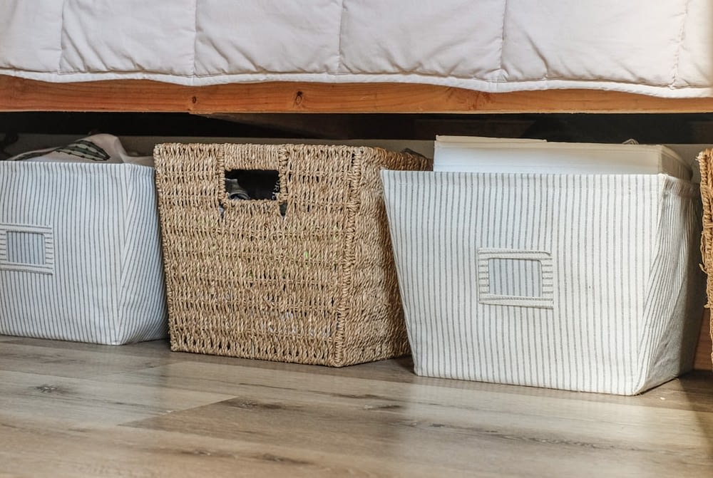 baby organization storage baskets under a bed