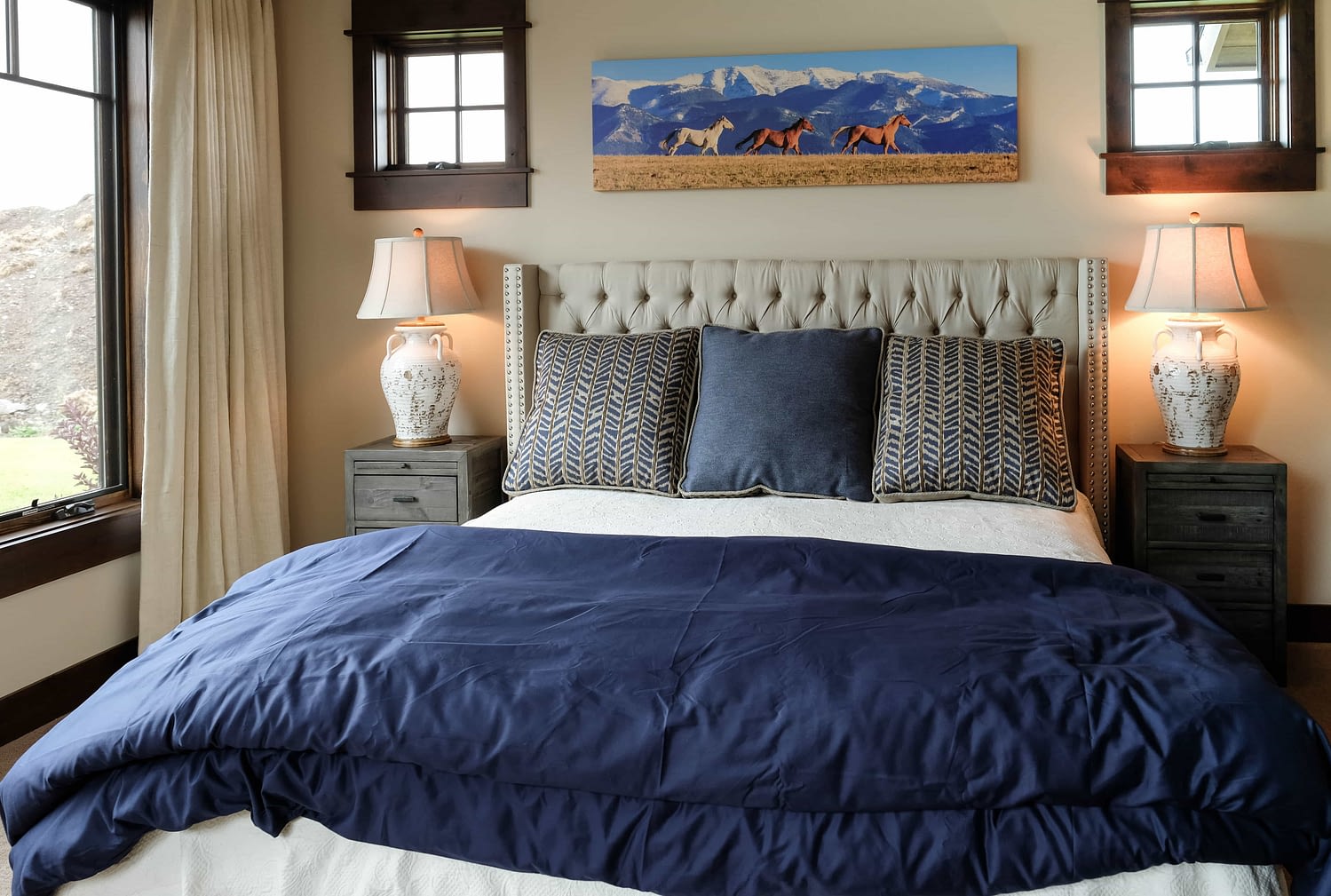 Parade of Homes bedroom with tan headboard, nightstands and lamps