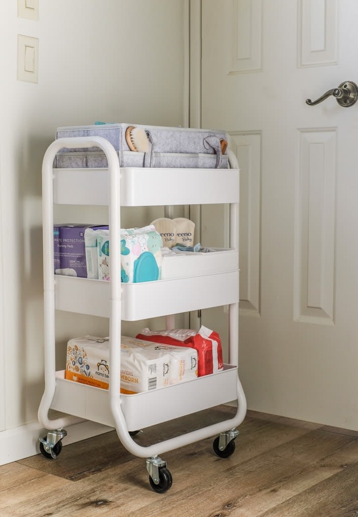 three tier utility cart for storing baby supplies 
