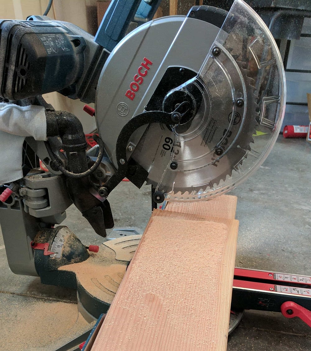 Bosch Miter Saw after cutting boards for a DIY Wood Plank Accent Wall