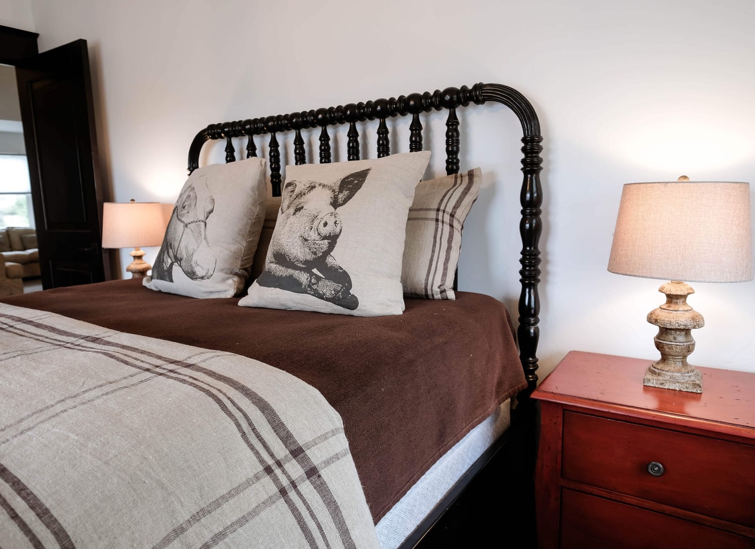 Parade of Homes bedroom with wooden headboard, nightstands and lamps