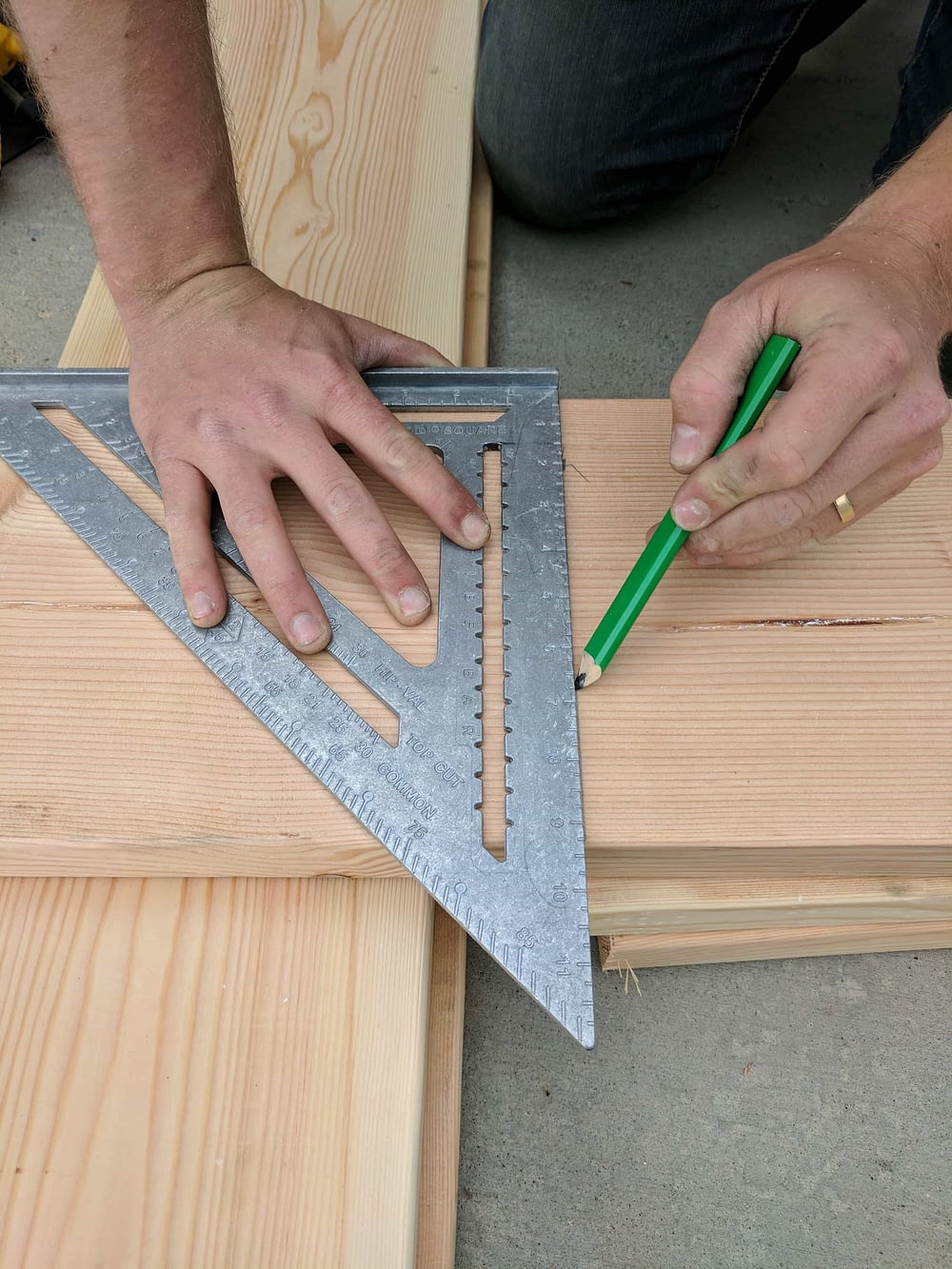 Using a speed square to mark 2" x 10" lumber