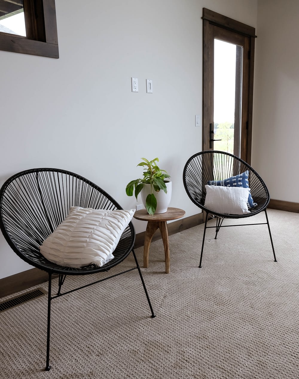 Parade of Homes living room with two mesh net chairs