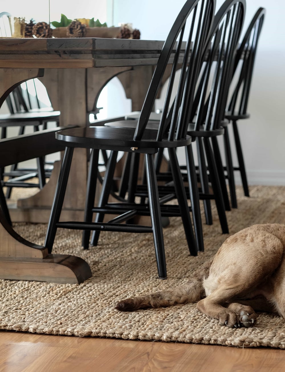 Jute Rug Review. Jute rug in dining room with table and chairs on it