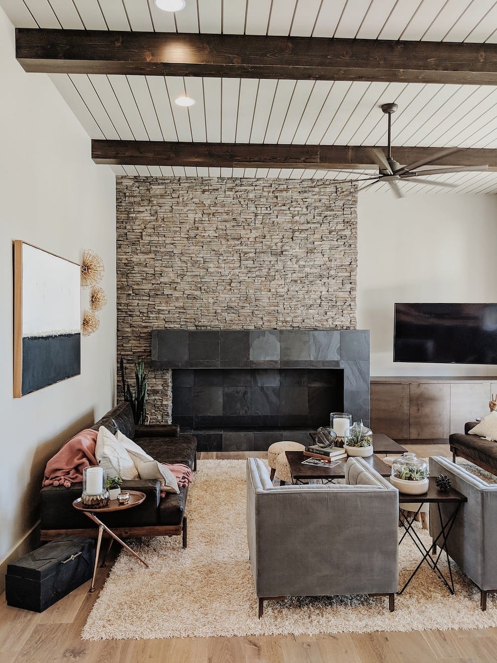 great room with a shiplap ceiling